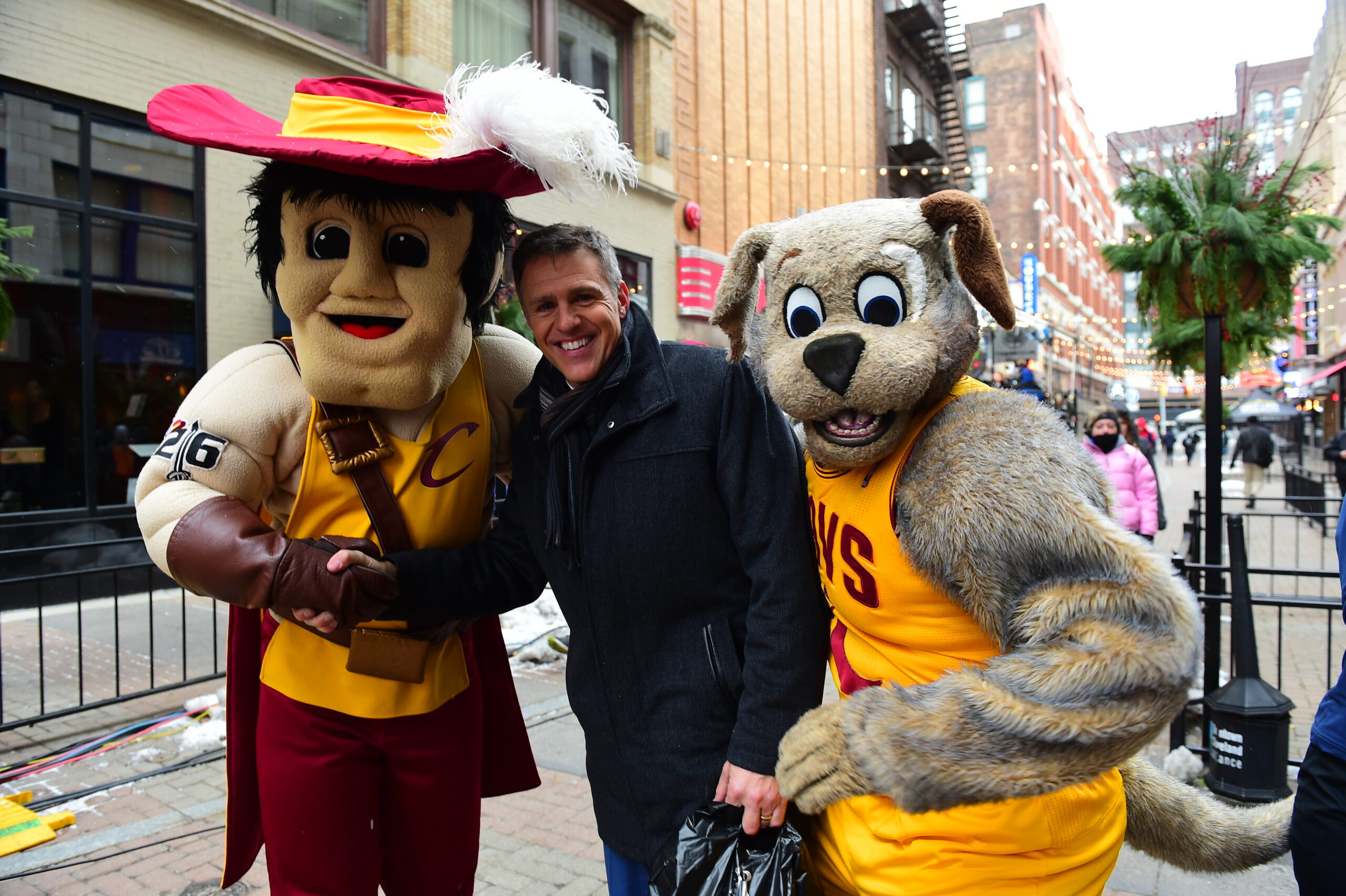 Cleveland, OH - November 19, 2014: Jay Crawford with Sir C.C. and Moondog mascots of the Cleveland Cavaliers at the offsite remote set of SportsCenter with (Photo by Phil Ellsworth / ESPN Images)