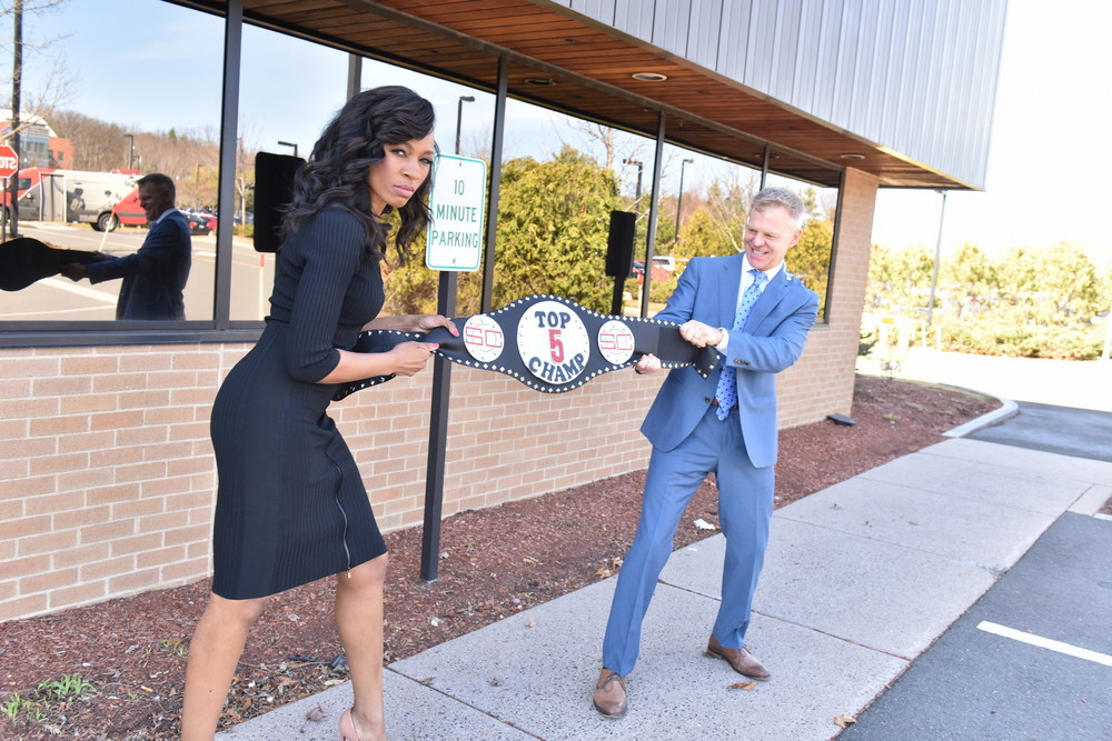 Bristol, CT - March 11, 2016 - Parking Lot: Cari Champion and David Lloyd with the Top 5 Champ belt (Photo by Nick Caito / ESPN Images)