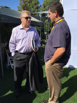 Coordinating producer Mike Cambareri (r) with NFL analyst Chris Mortensen at the NFL owners meetings in Phoenix. (Jess Kraus/ESPN)