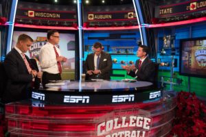 A look at Studio G before its transformation: (L to R) From December 2014, ESPN analysts Brock Huard, and Ed Cunningham, studio host Chris Cotter and UConn football coach Bob Diaco on the set of College Football Live. (Rich Arden/ESPN Images)