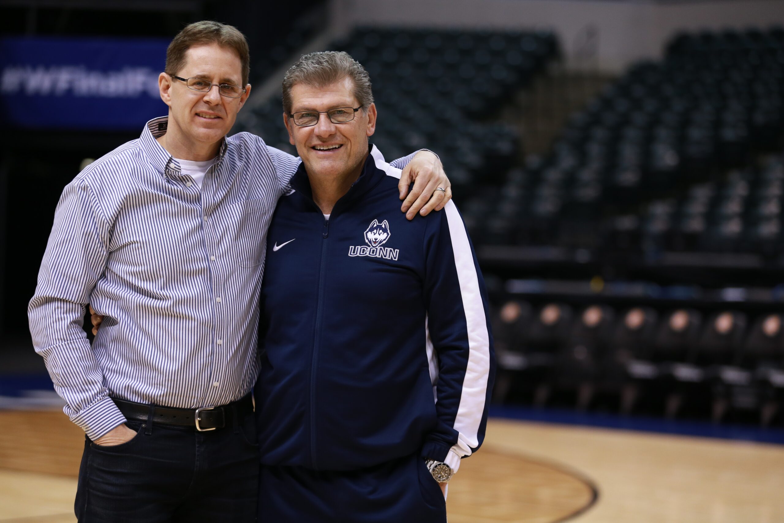 Phil Dean (left) with UConn Women's Head Coach Geno Auriemma in Indianapolis during the #FinalFour. (Allen Kee/ESPN Images)