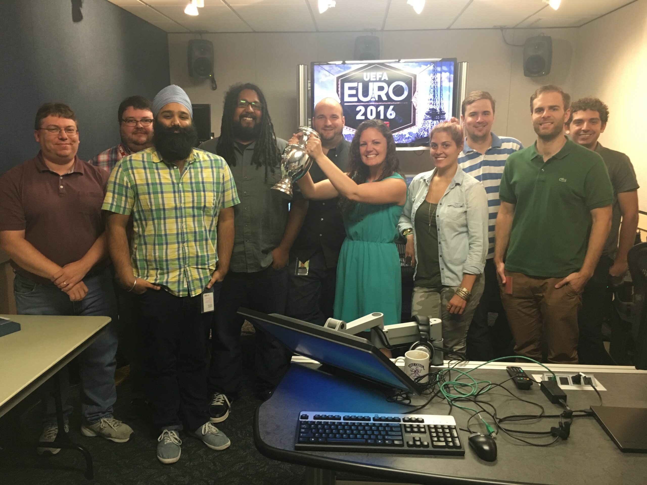 (L-R) Tom Beers, Rob McNicholas, Kartar Singh, Dale Mauldin, Justin Belcher, Tara Baker (center) Meghan Robinson, Lucas Haskins, Brian Arnold, Joshua Vorensky. (Courtesy of Tara Baker)