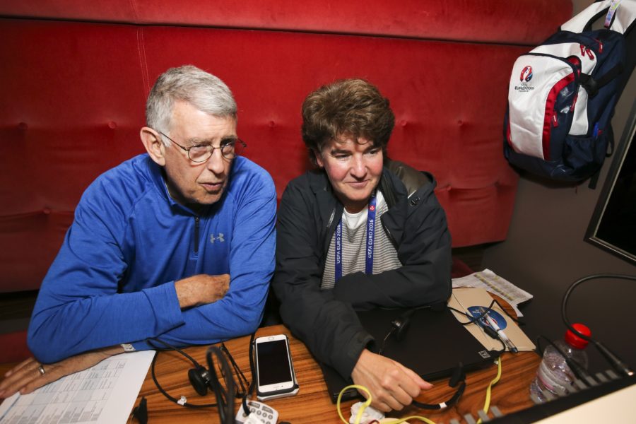 Amy Rosenfeld (right), senior coordinating producer and head of production for UEFA EURO 2016 on ESPN, and senior production specialist Geoffrey Mason, a longtime, highly accomplished sports television executive, in a remote production truck at ESPN’s host set location along the banks of River Seine in Paris. (Catherine Steenkeste/ESPN Images)